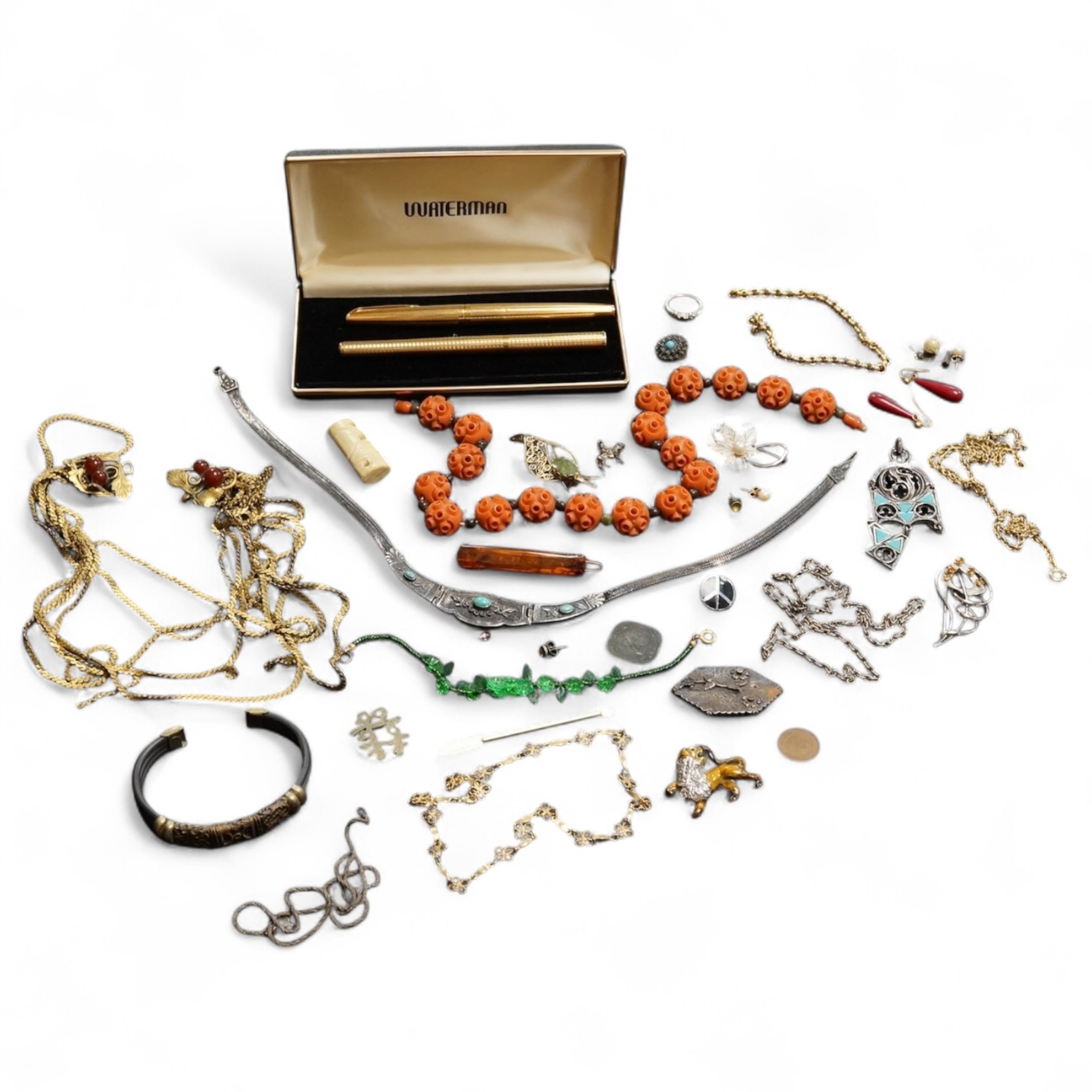 A small group of assorted costume and other jewellery, including a late Victorian silver hexagonal brooch(a.f.) a platinum and gem set ring and two pens Waterman and Elysee.